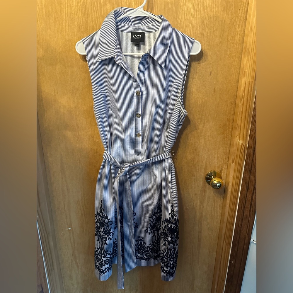 Navy blue and white stripped collared dress with floral stitching detail